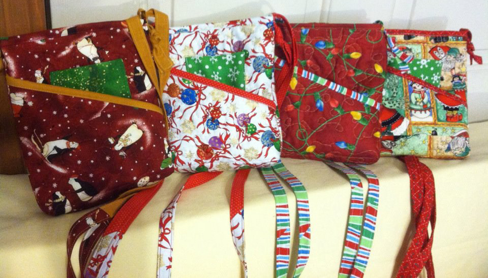 Hand-made cloth holiday purses by Tamara Davenport at Koala-t Krafts.
